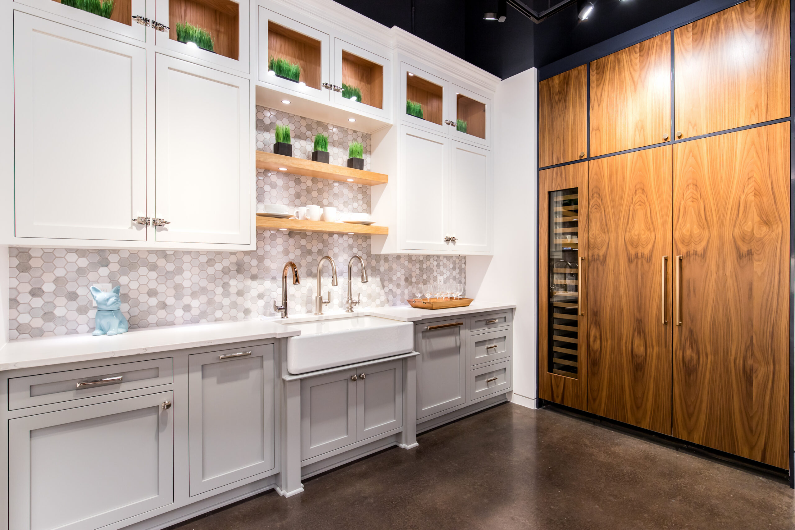 Commercial-grade kitchen with natural wood veneer finish cabinets installed by StyleCraft Cabinets TX in a Dallas property