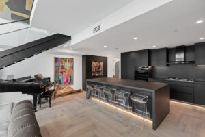 Open-Concept-Living-No-Hardware-Cabinetry-Wetbar-StyleCraft-Dallas-scaled