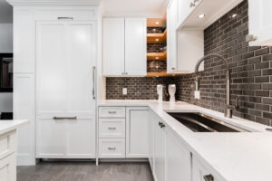 Remodeled Duplex with Sleek Cabinets by StyleCraft Cabinets Dallas