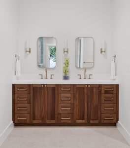 Spacious Palo Pinto Bathroom with Double Vanities by StyleCraft Cabinets TX condo