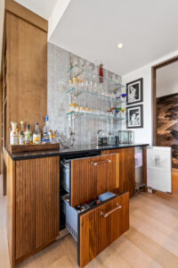 Wet Bar with drawers open installed in Dallas High Rise condo by StyleCraft Cabinets TX.jpg