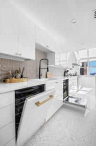 White-Kitchen-Cabinets-Marble-Backsplash-Pendant-Lighting-Premium-by-StyleCraft-Cabinets-TX-for-Dallas-Designers